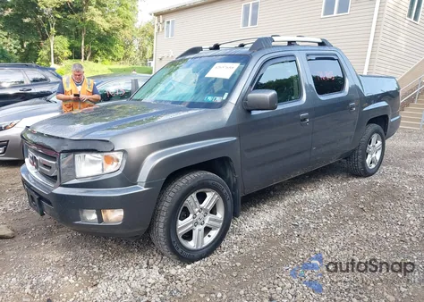 2011 Honda Ridgeline Rtl z USA, uszkodzony, nr VIN 5FPYK1F55BB005874